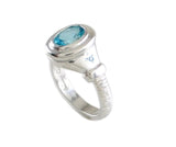 Bezel set gemstone ring with "coin edge" motif