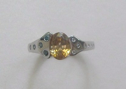 Golden Burmese Zircon and Diamond Ring